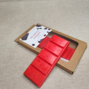 Tablette fondante parfumée coquelicot présentée dans son emballage.